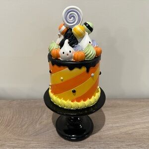 Halloween Themed resin Decorative Cake on a pedestal.